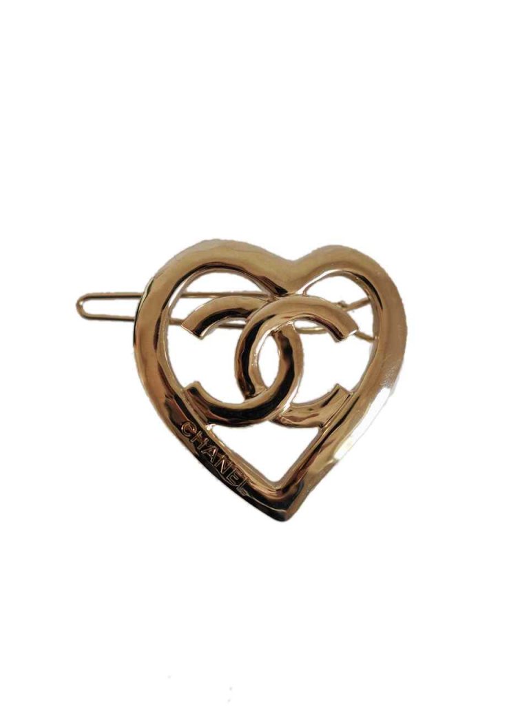 Chanel 22S heart hair clip in gold metal | Vintage-United