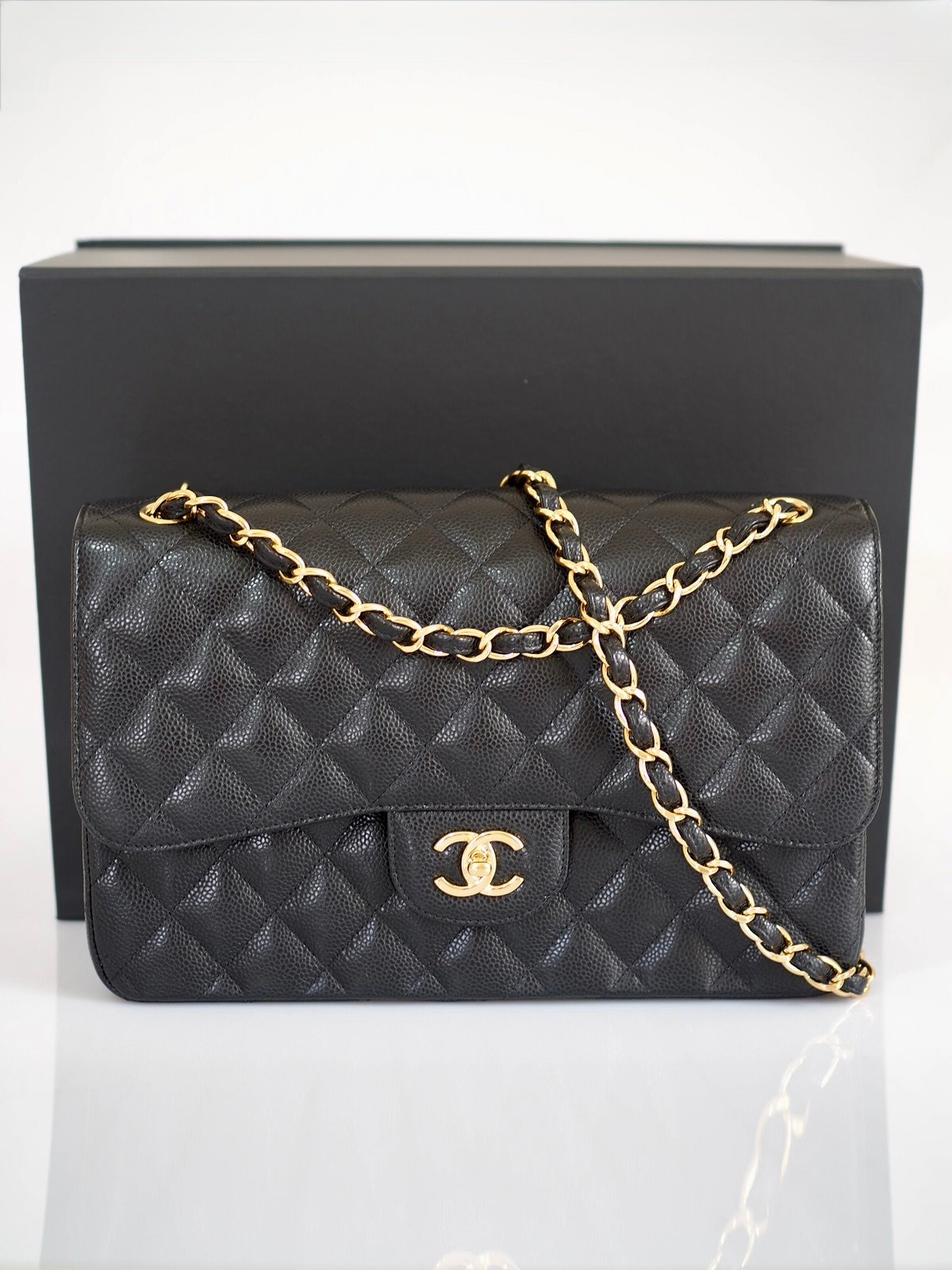 Chanel Classic jumbo double flap bag black caviar leather gold hardware authentic